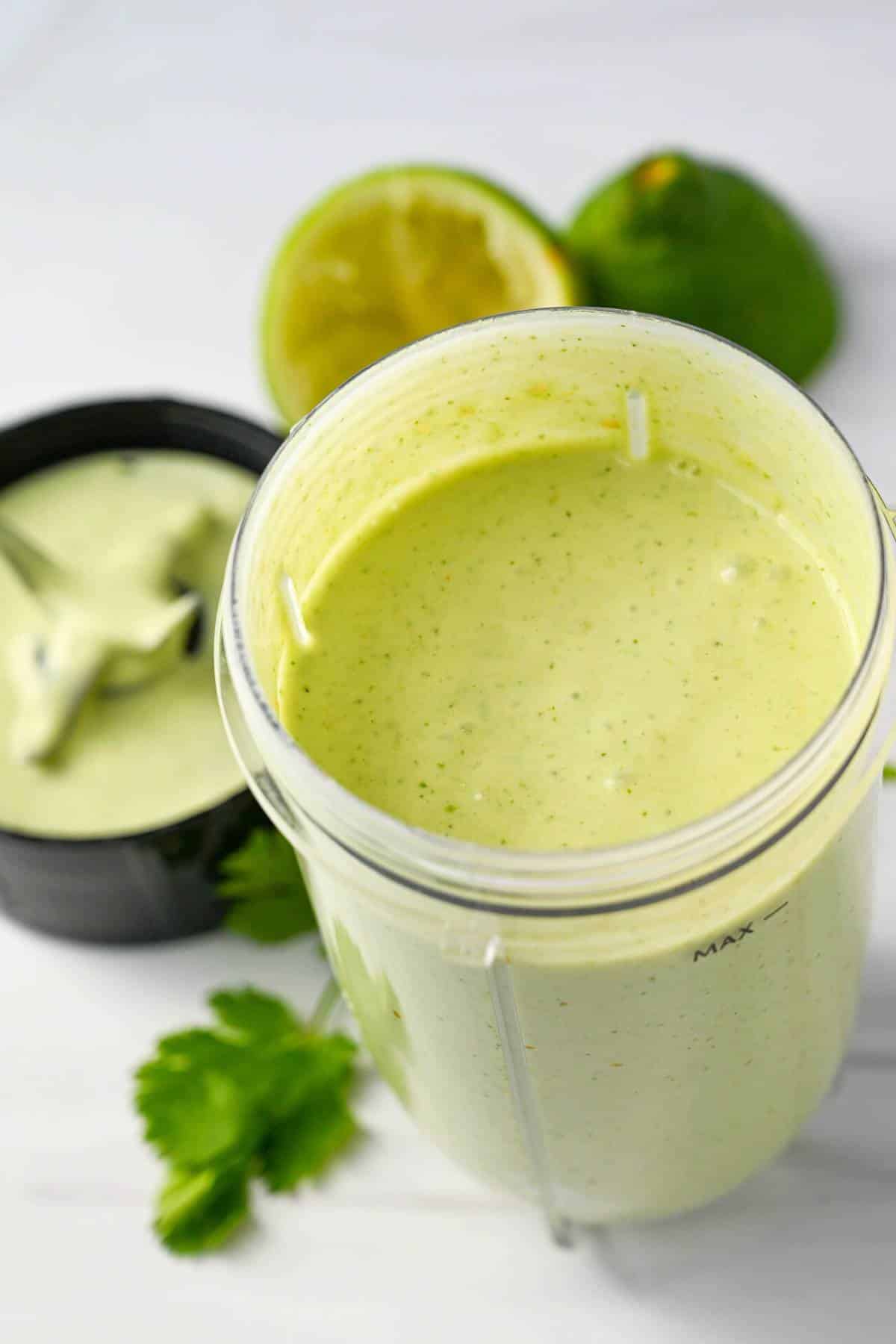 blended cilantro lime dressing in a magic bullet