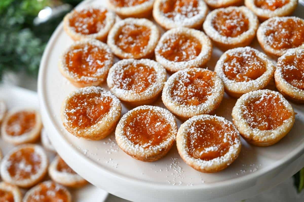 close up of a platter of homemade dried apricot tarts