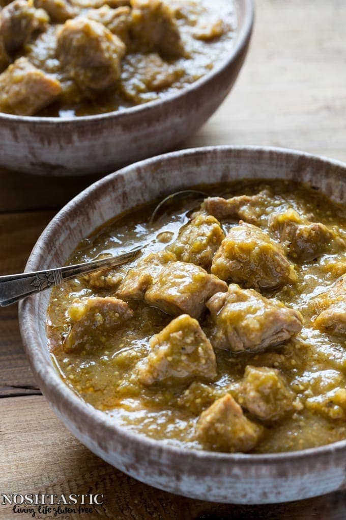 Green chili Verde in a bowl with a spoon