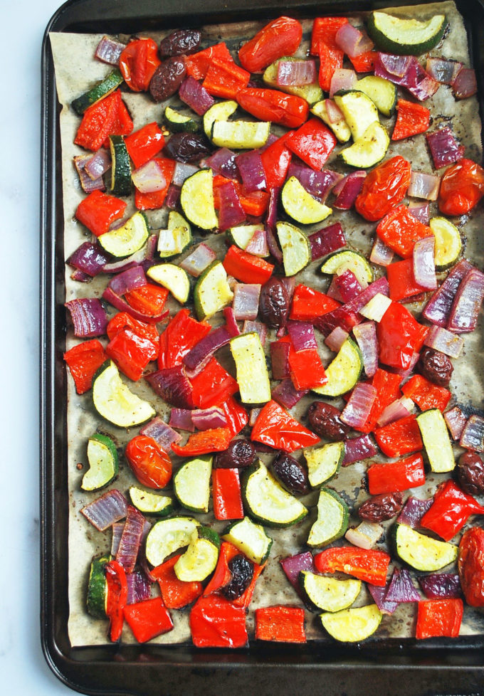 overhead photo of a baking sheet with roasted vegetables