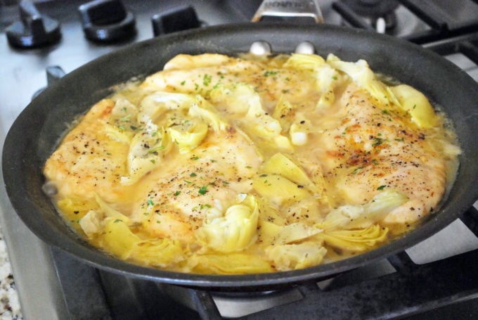This deliciously easy Lemon Artichoke Chicken is made with thin chicken breast cutlets, marinated artichokes, fresh lemon juice and parsley. 