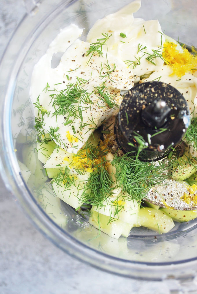 Ingredients for tzatziki sauce in a food processor