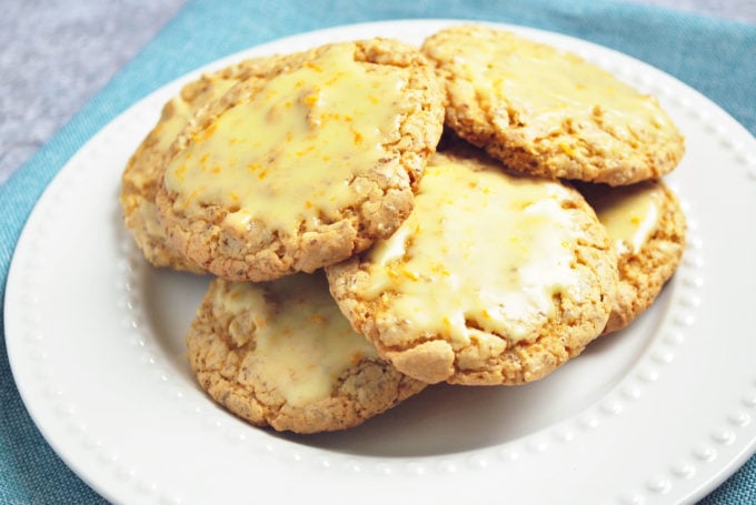 Orange glazed cookies on a plate