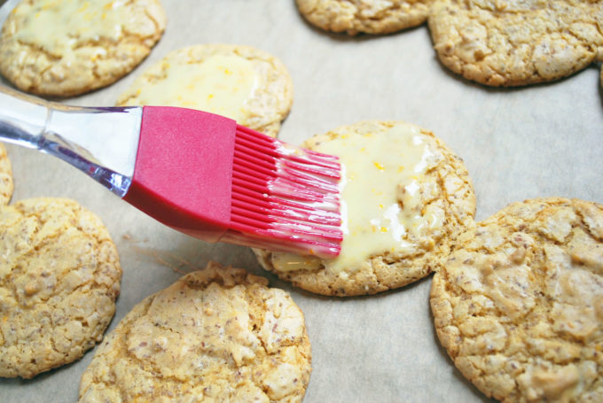 applying frosting glaze for frosted orange easy cake mix cookies