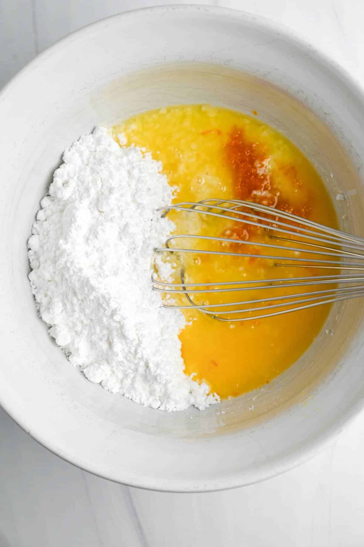 orange glaze ingredients in a mixing bowl