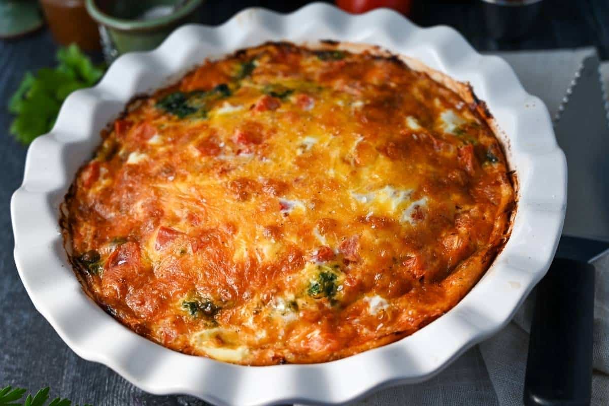 a baked cheeseburger quiche in a dish 