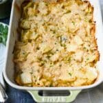 looking down at a pan of baked cabbage casserole with melted parmesan on top