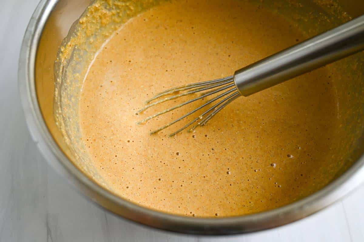pumpkin pancake batter mixed in a bowl