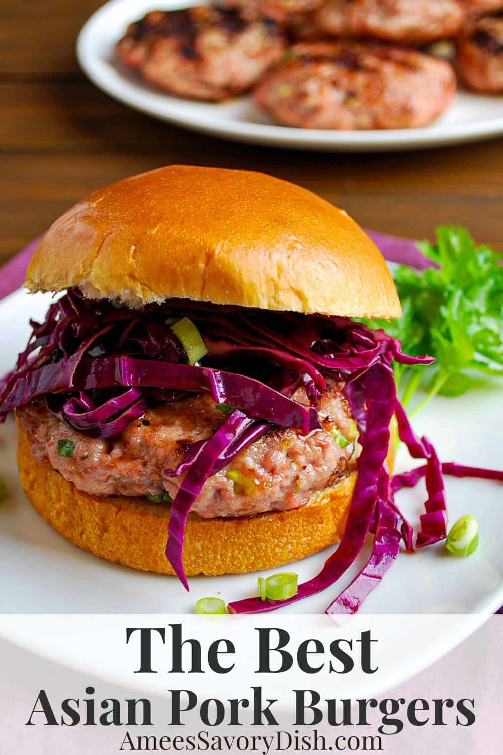 This easy recipe features umami-rich grilled pork patties topped with crunch Asian slaw served on a buttery brioche bun. via @Ameessavorydish