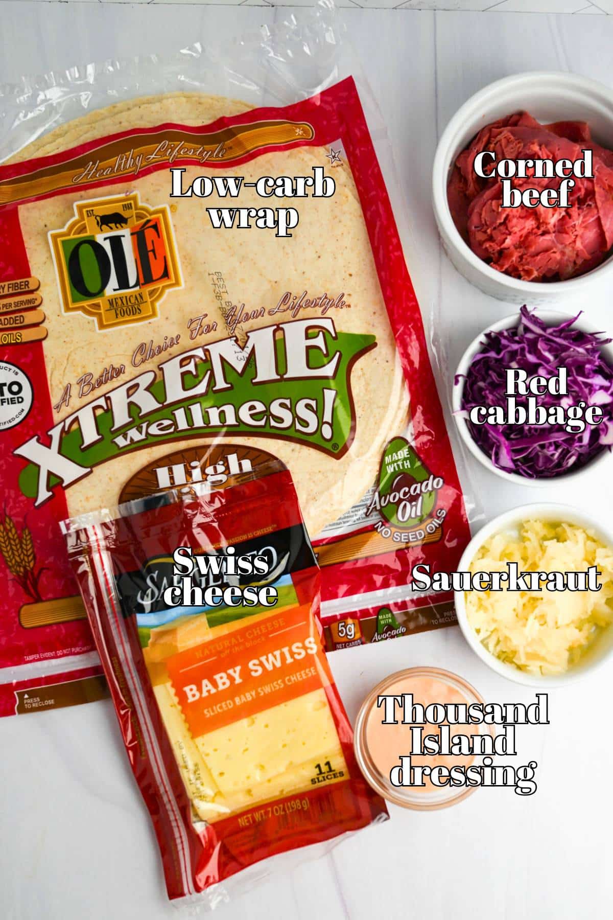 ingredients for a reuben wrap measured out on a counter