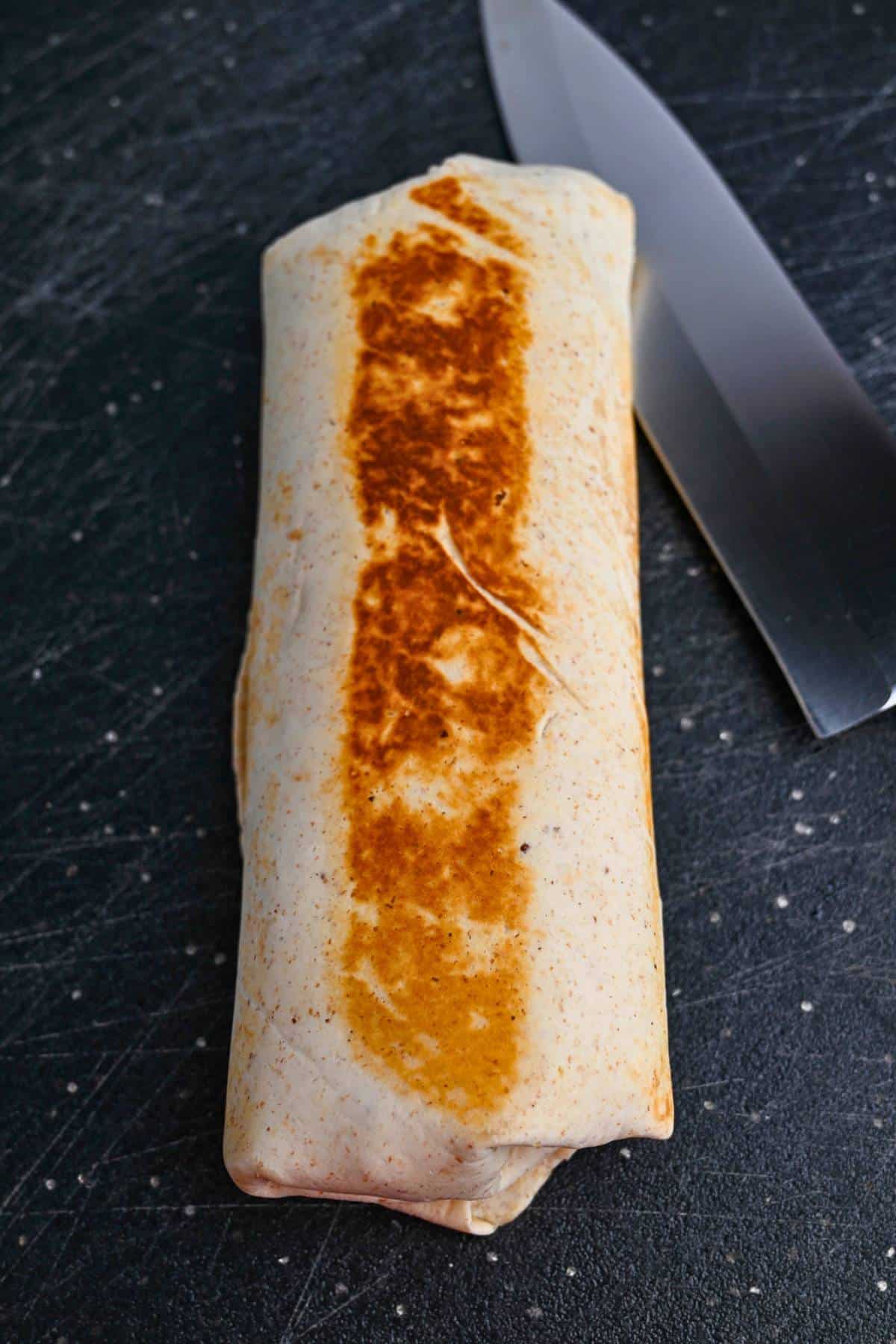 toasted wrap on a cutting board
