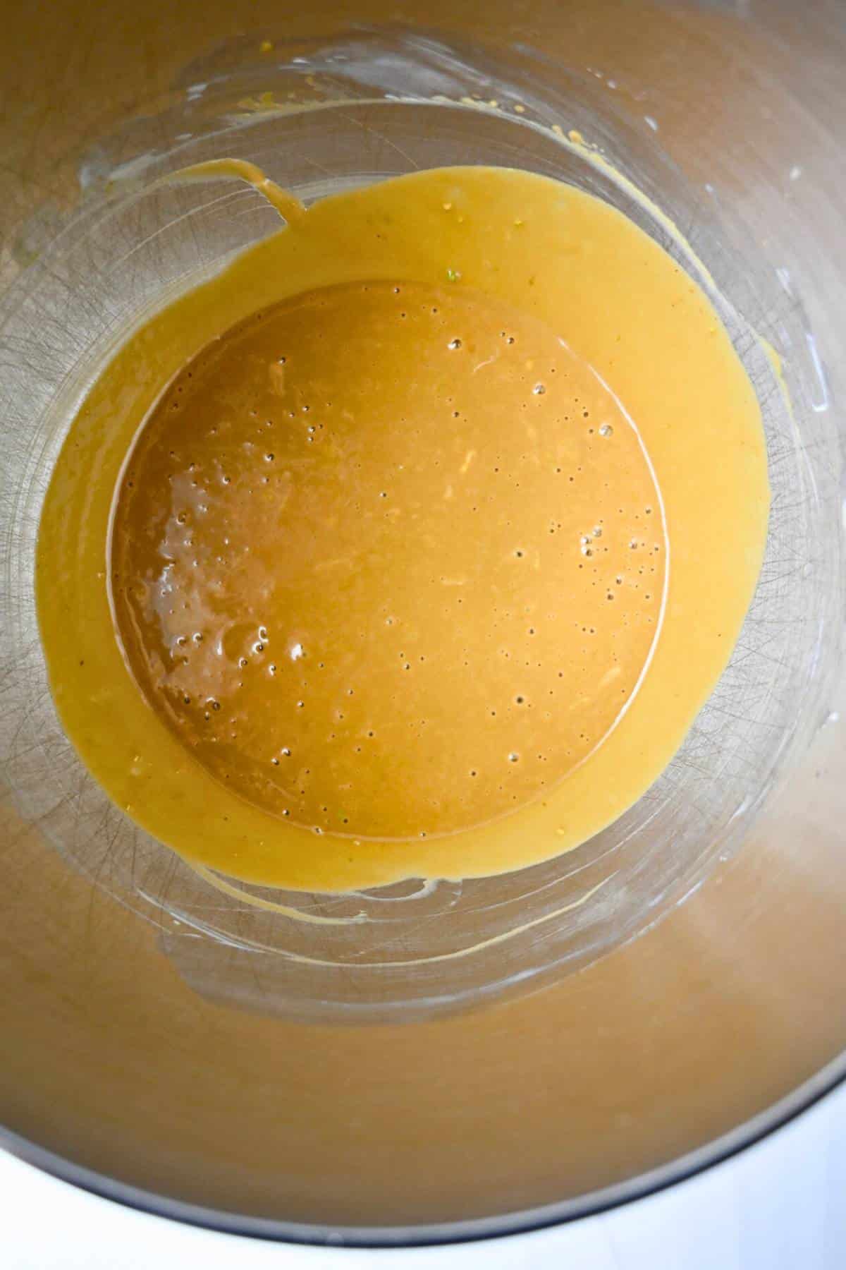 wet ingredients for muffins mixed in a bowl