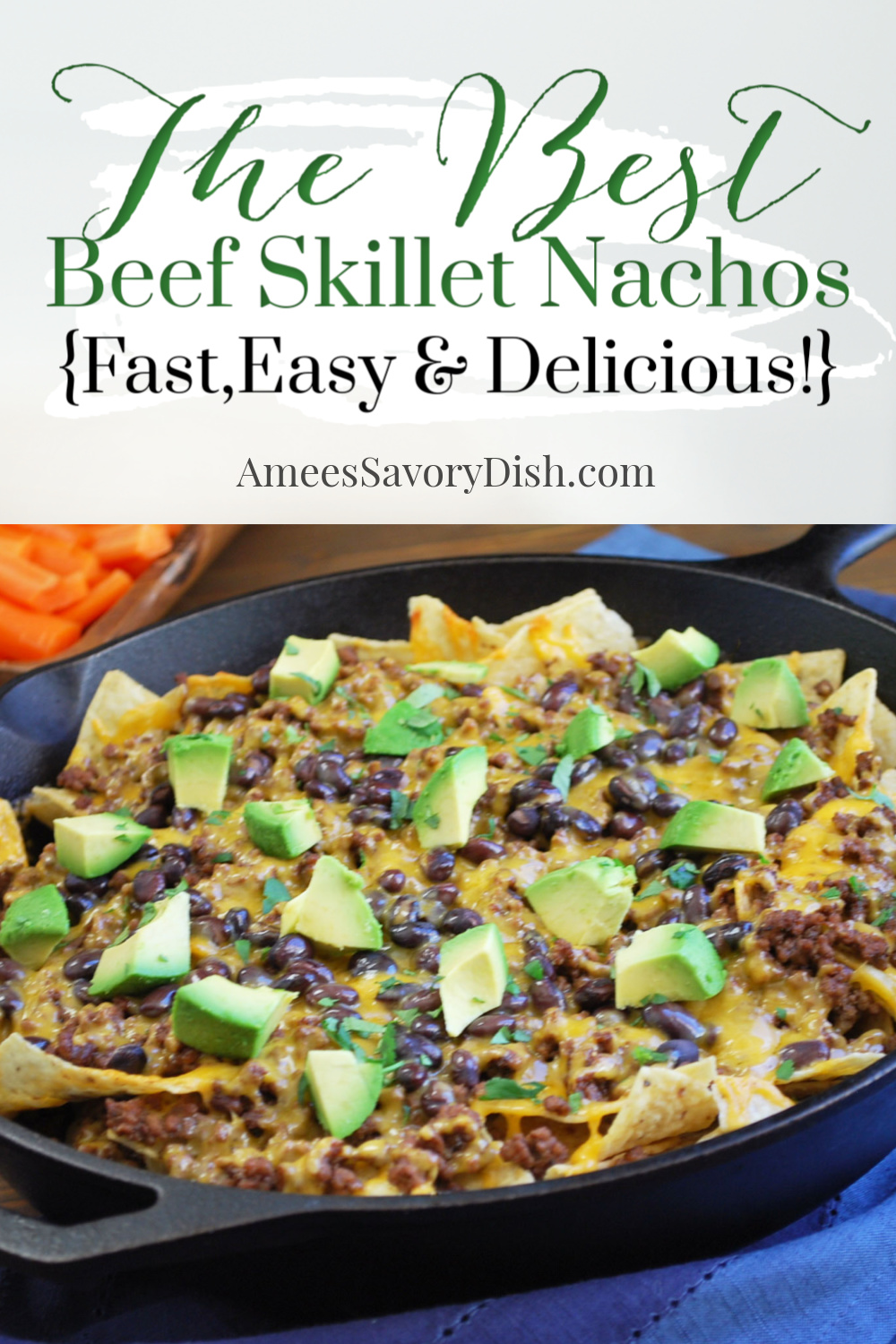 An easy oven-baked skillet nachos recipe made with tortilla chips, black beans, seasoned ground beef, and shredded cheese baked in a cast-iron skillet.  via @Ameessavorydish