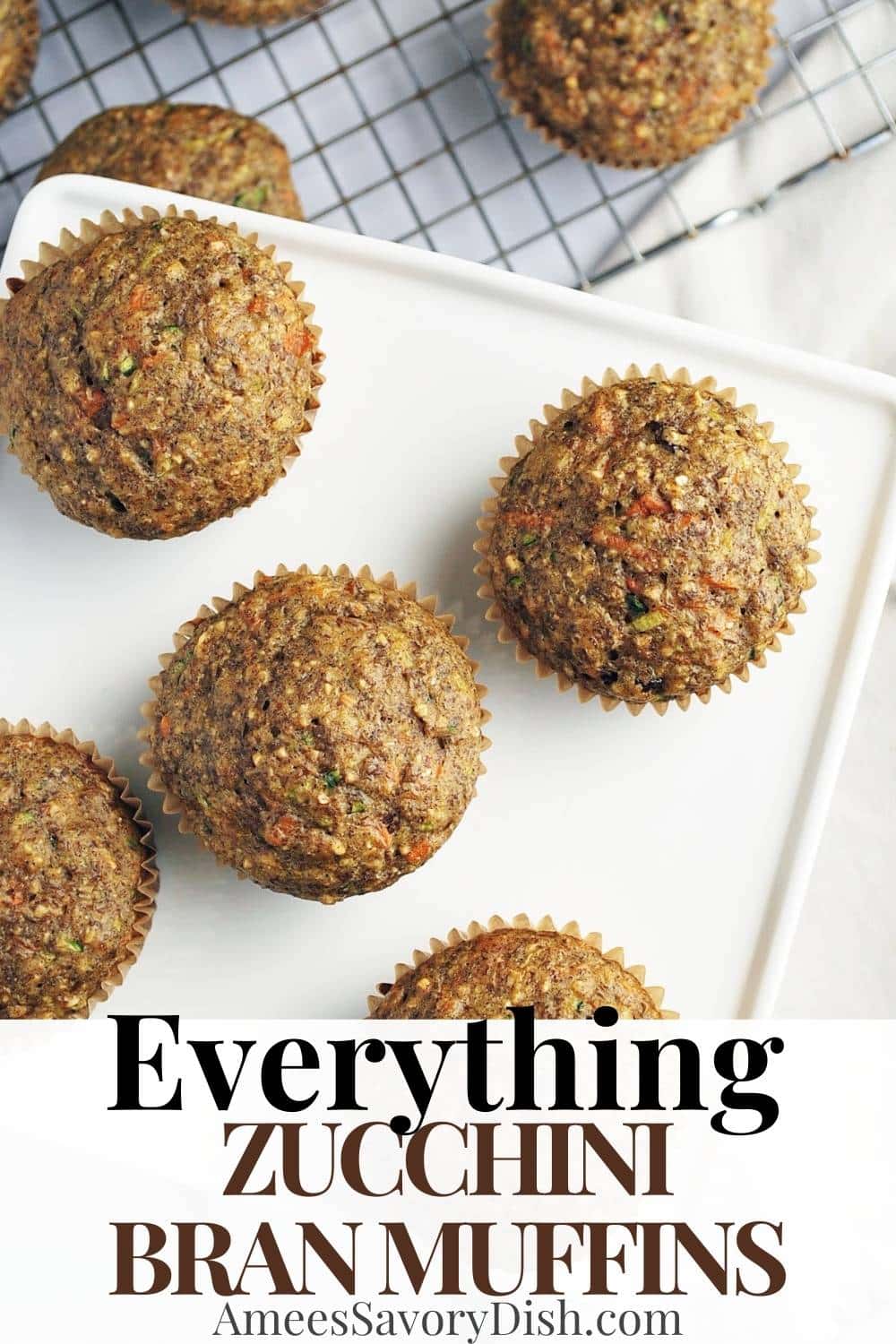 These zucchini bran muffins are made with shredded zucchini and carrots, unbleached flour, ground flaxseed, oat bran, raisins, and walnuts.  This healthier muffin recipe is simple and incredibly delicious!   via @Ameessavorydish