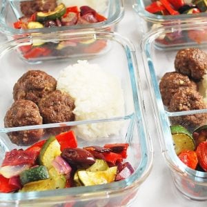 Greek meatballs with rice and roasted veggies in meal prep containers