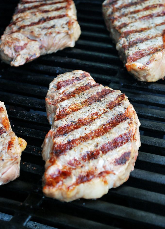 New York Strip steaks on the grill