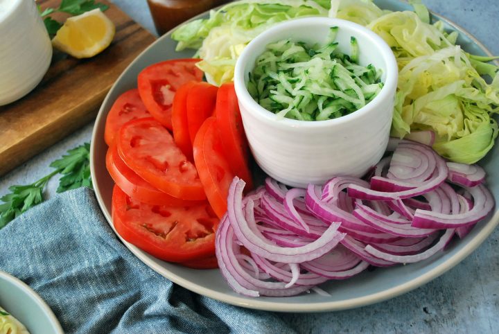 kofta wrap toppings on a plate