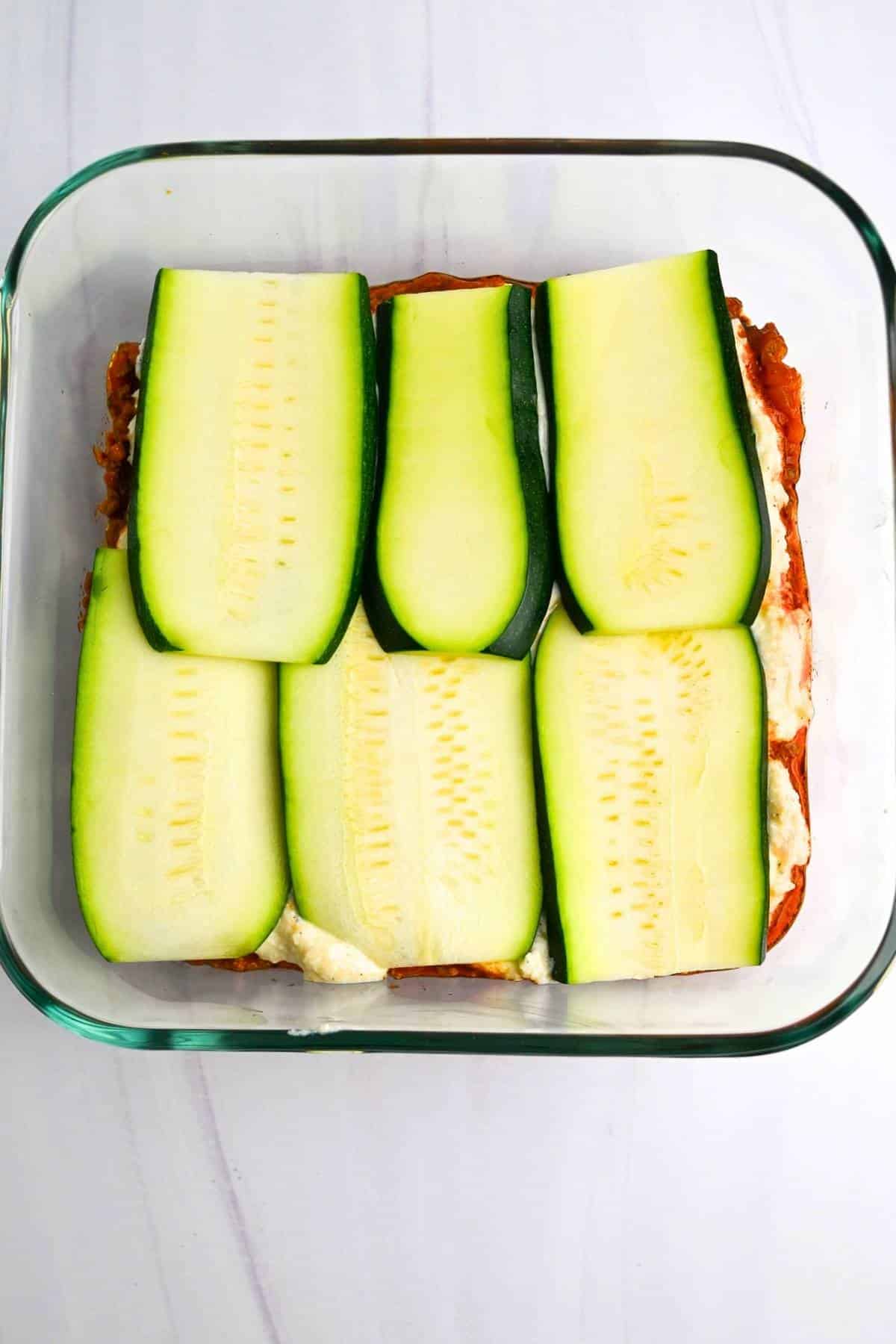 zucchini slices in place of pasta in a lasagna pan