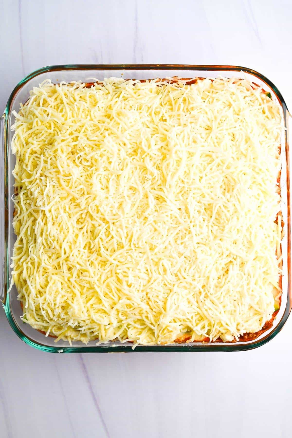 finshed assembled lasagna with squash ready to bake