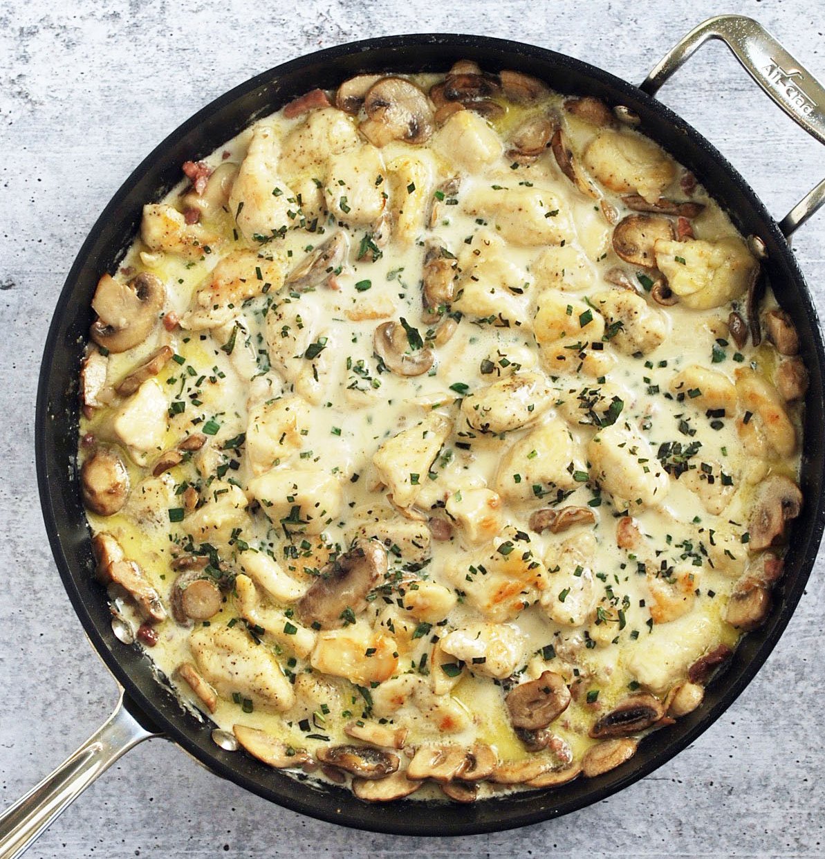 finished creamy tarragon chicken in a skillet