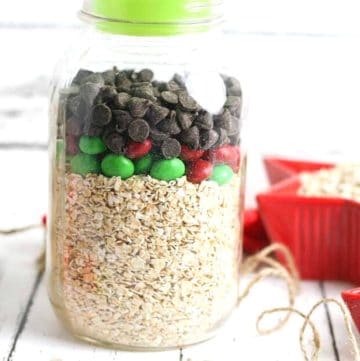 Oatmeal, M&Ms, and chocolate chips layered in a jar