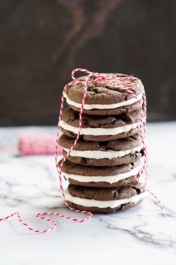 homemade oreos stacked with a ribbon tied around them