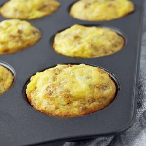 Sausage egg muffins in a muffin pan fresh from the oven