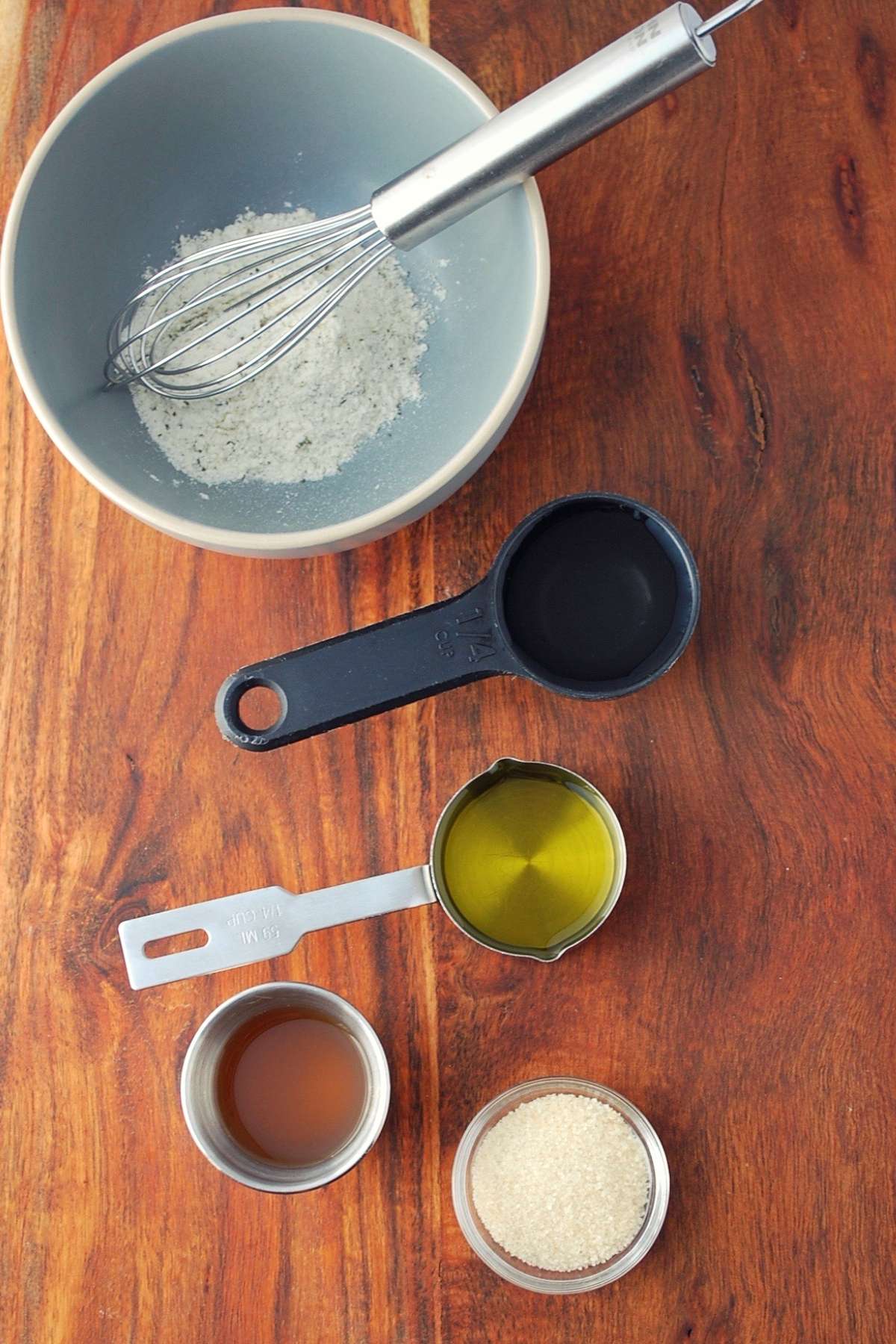 ingredients for ranch vinaigrette on a cutting board