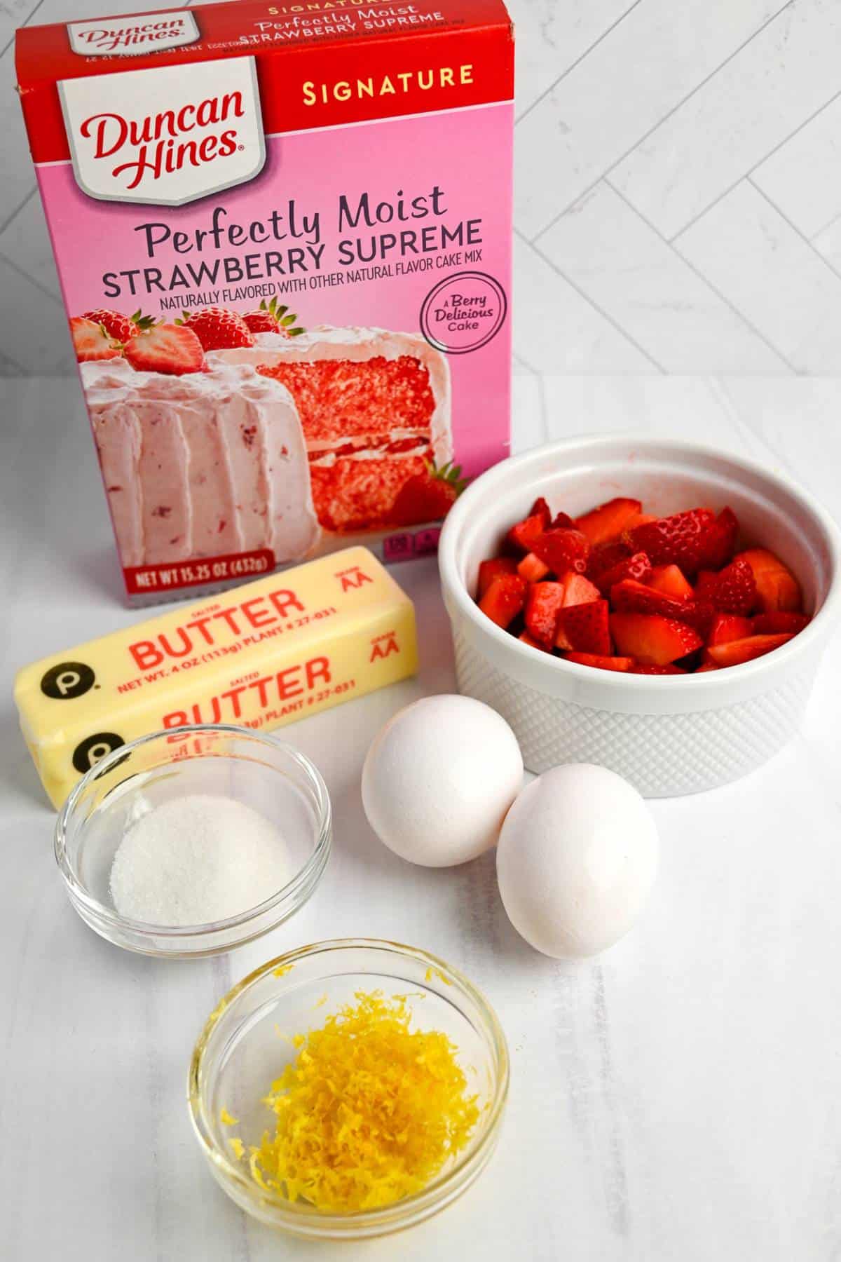 ingredients for strawberry lemon cookies on a counter
