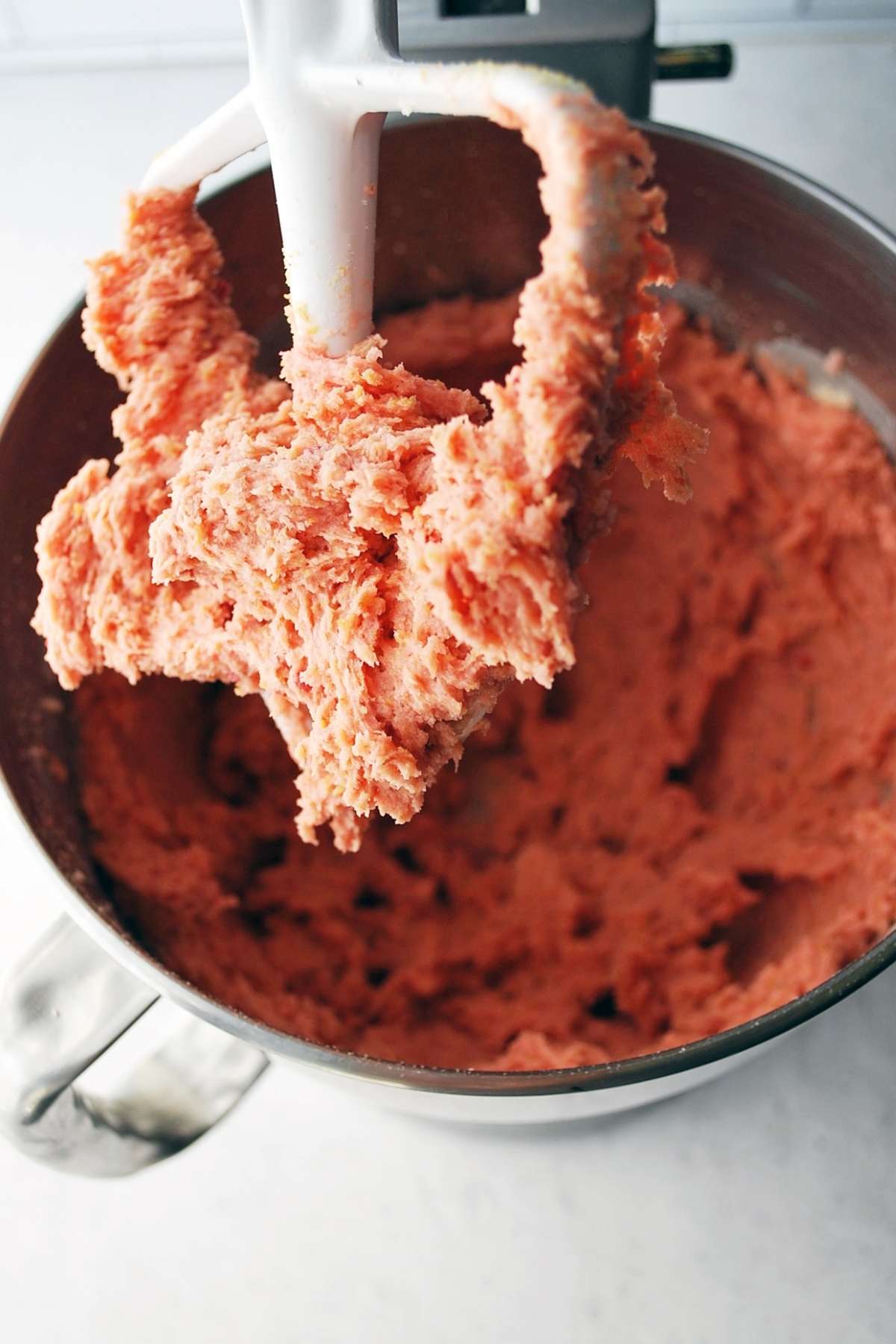 strawberry cookie batter in a mixing bowl