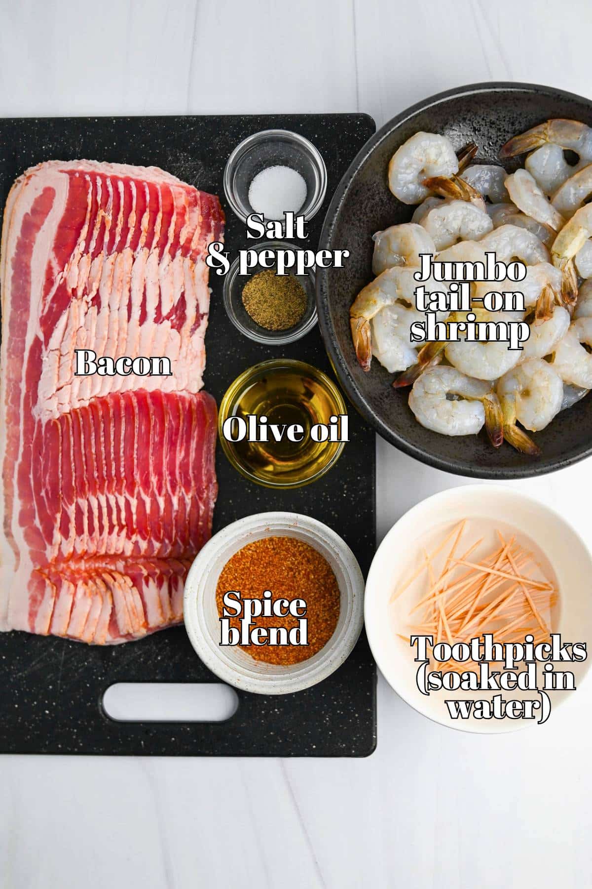 ingredients for bacon wrapped shrimp on a counter