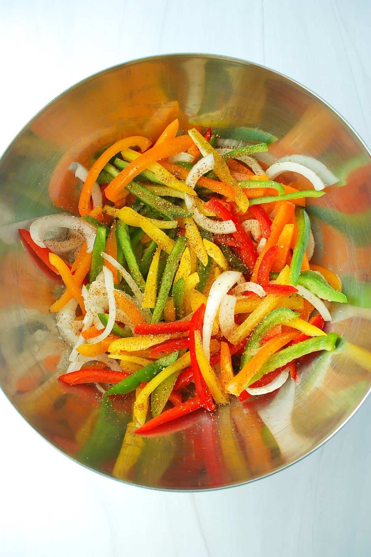 sliced fajita veggies in a bowl