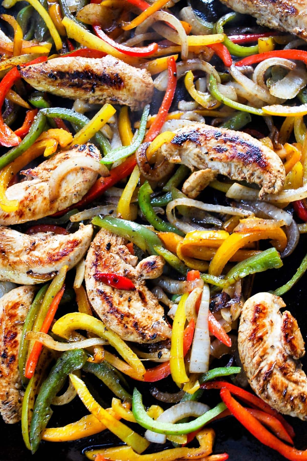 chicken fajitas cooked on a Blackstone griddle