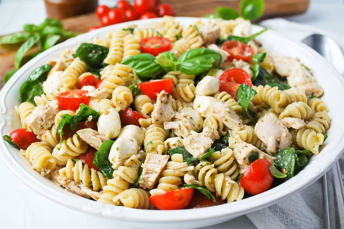 a colorful bowl of ready to serve pasta salad