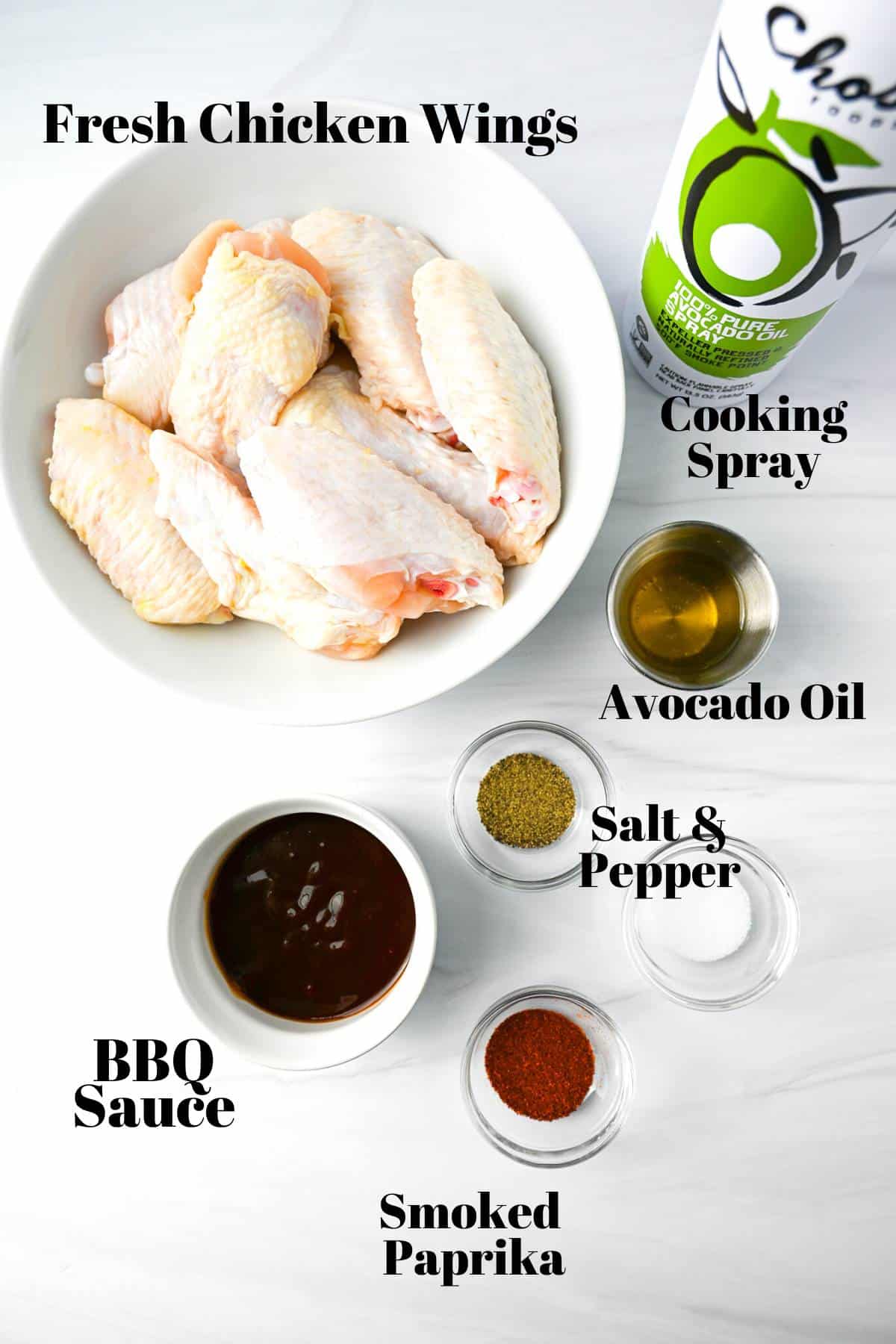 ingredients for air fryer BBQ chicken wings on a white counter