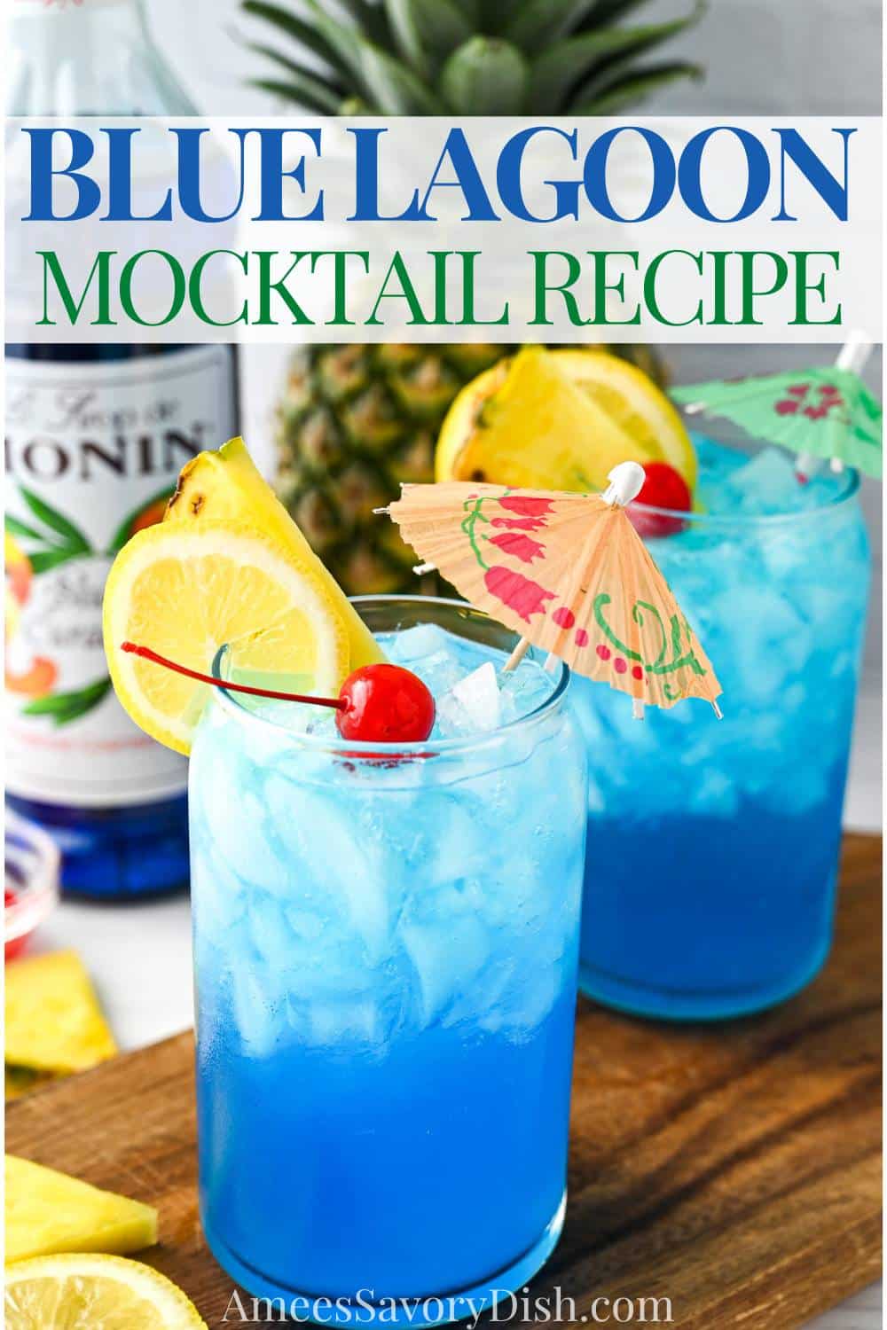 This Blue Lagoon Mocktail, made with blue curacao syrup, fresh lemonade, and a sparkling soda, is a sweet and citrusy Caribbean-sea-colored drink the whole family can dive into! Perfect for essentially any occasion! via @Ameessavorydish