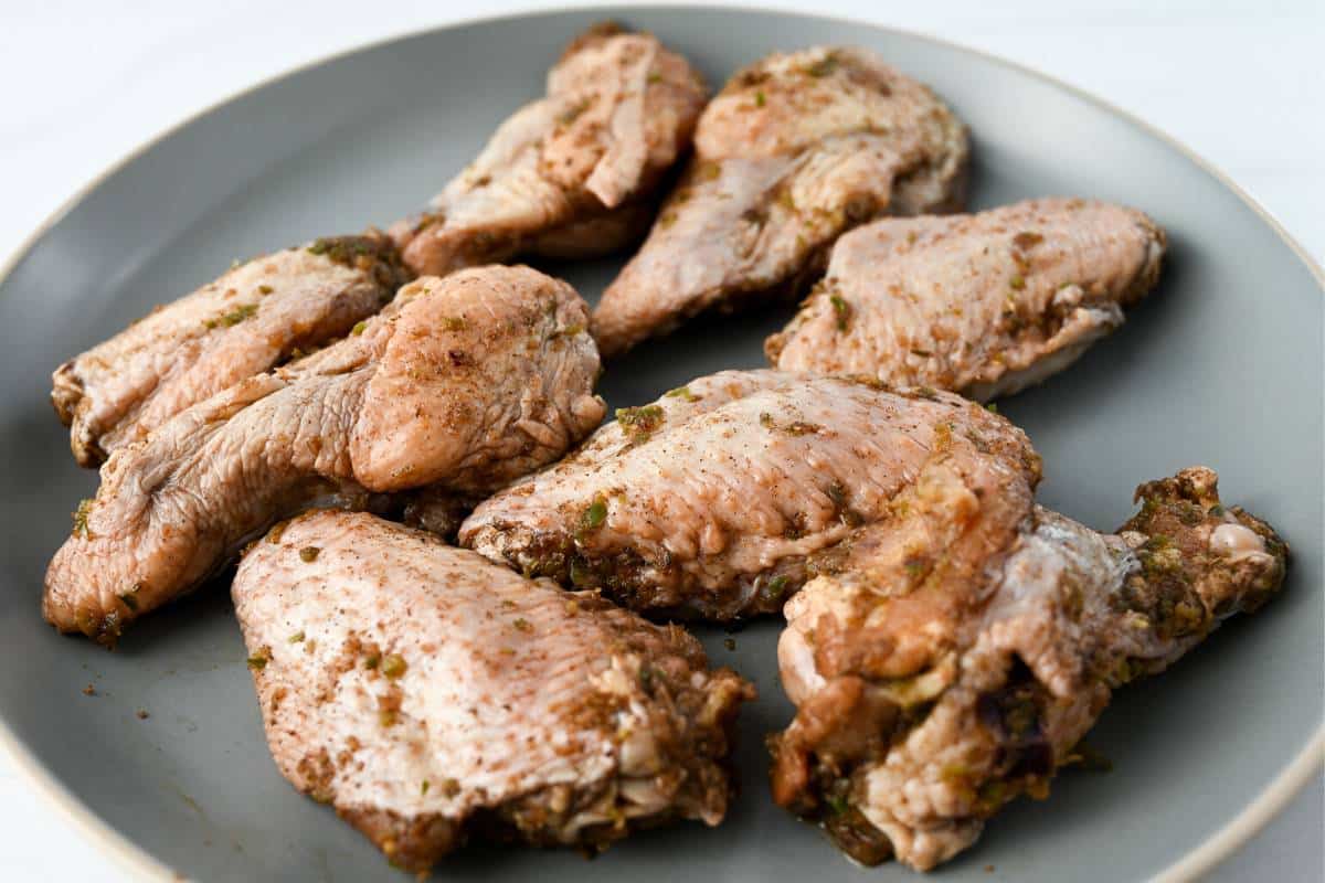 jerk wings patted dry on a plate