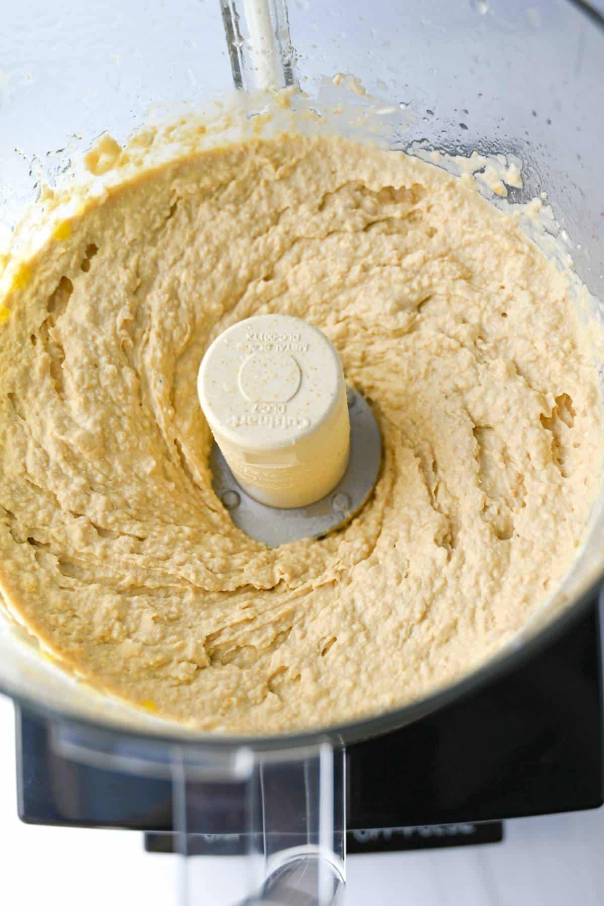 blended hummus in a food processor