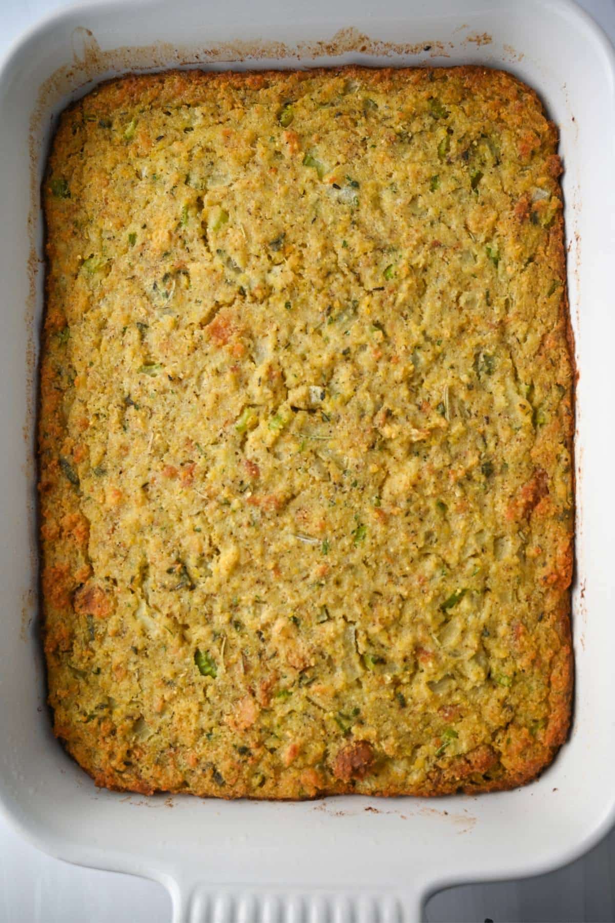 a pan of cornbread dressing hot from the oven