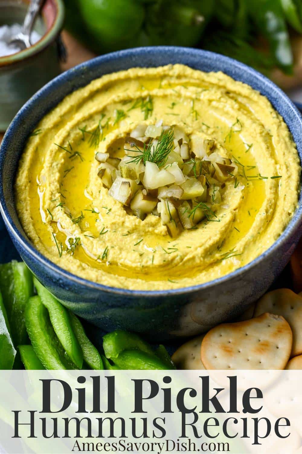 This easy-to-make Dill Pickle Hummus recipe blends creamy chickpeas, garlic, tahini, dill pickles, and fresh herbs for an irresistibly tangy twist on the classic Middle Eastern dip. via @Ameessavorydish