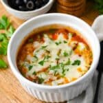 close up photo of a low carb high protein pizza bowl with fresh herbs