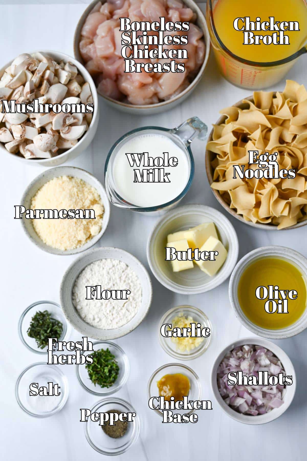 labeled ingredients for making a creamy chicken noodle casserole on a counter