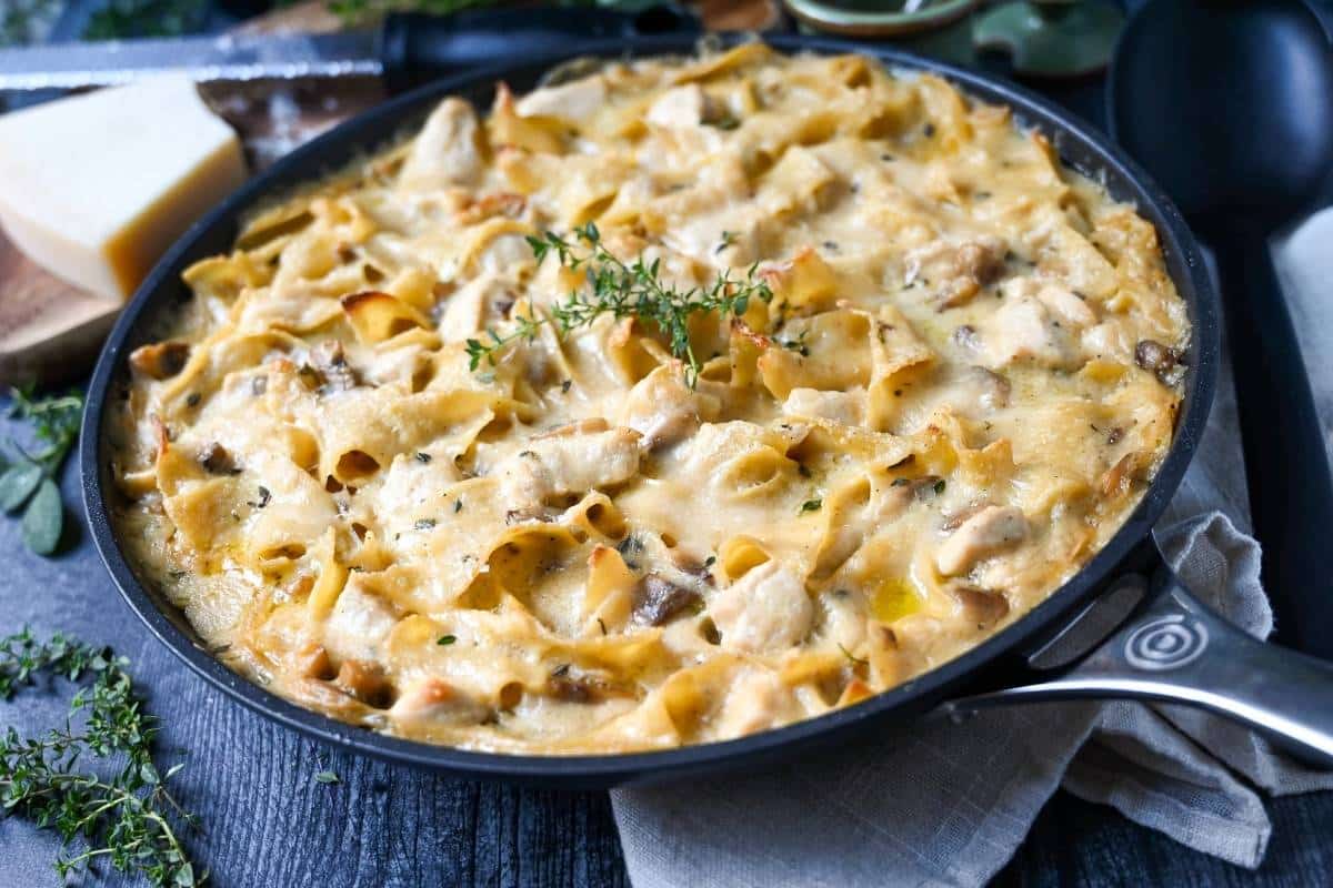 side view of a cooked creamy chicken noodle casserole without canned soup in the ingredients