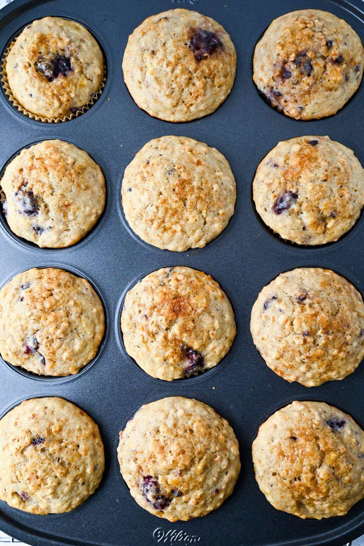 baked banana muffins in a tin