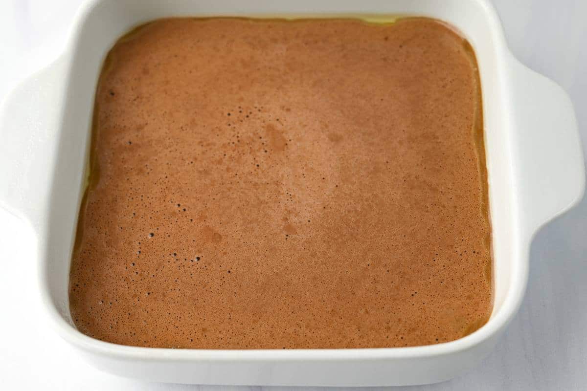 brownie oats batter in a baking dish ready to bake