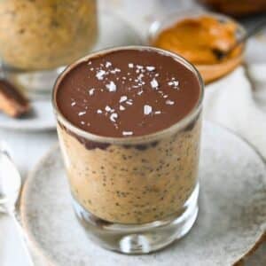 close up of a pb chocolate overnight oats jar topped with flaked salt