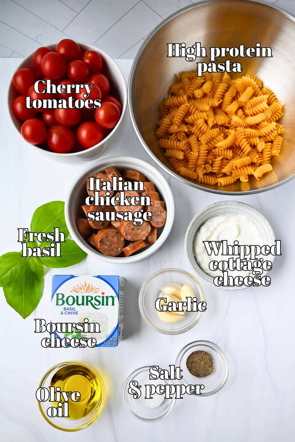 ingredients for the viral pasta dish with boursin and tomatoes measured out on a counter 