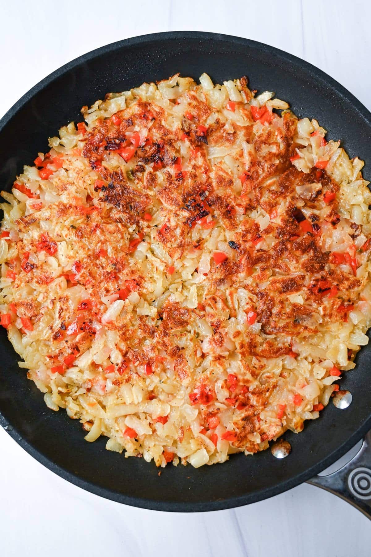 cooked hashbrowns in a skillet