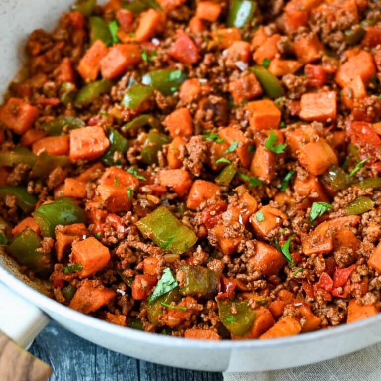close up of a ground beef skillet meal in a white skillet