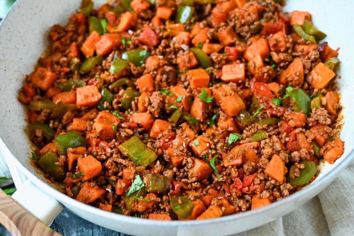 a cooked skillet close up photo made with chopped sweet potatoes